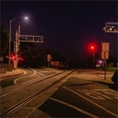 Railroad crossing at night