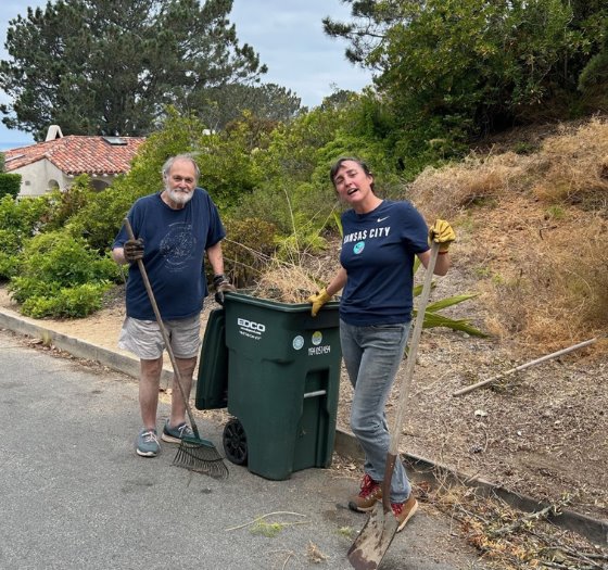 residents fill bin with yard waste