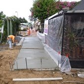 Rebuilt sidewalk at Cafe Secret.