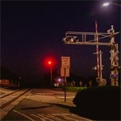 crossing gates at night