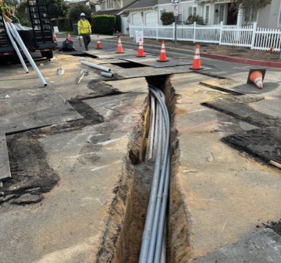 Conduit inside of open trench