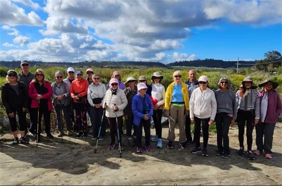 hikers in river park