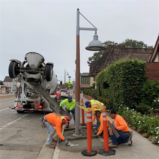 sidewalk repairs at streetlight