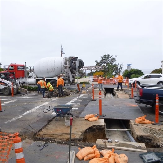 Storm drain crossing Camino del Mar at 11th Street