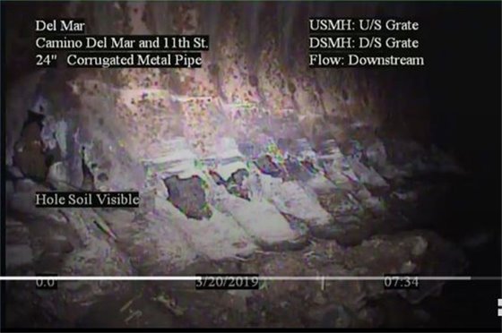 Corroded old steel storm drain at 11th Street