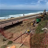 worker in drainage channel