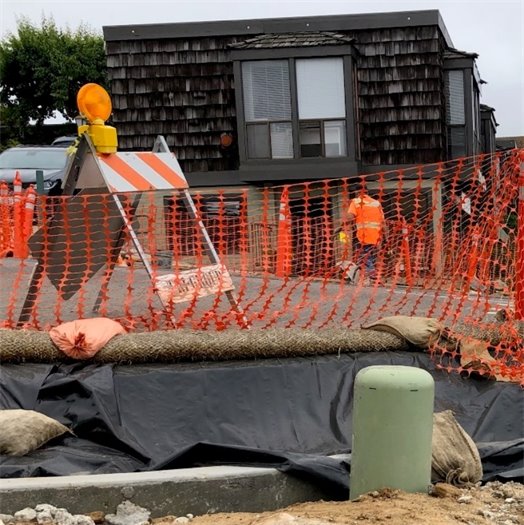 Uneven pavement and curb at 11th Street