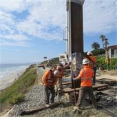 workers on bluffs project