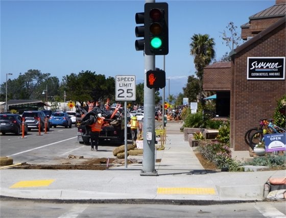Finished sidewalks and pedestrian ramps at 9th Street